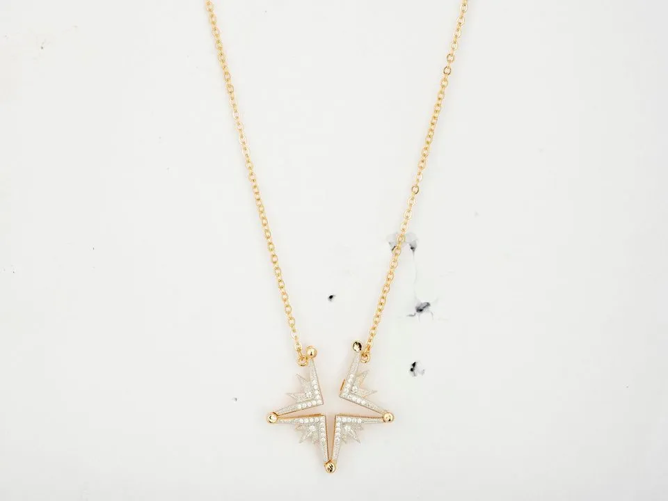 Before: Gold star pendant, as photographed