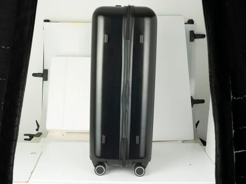 Before: Black suitcase, as photographed